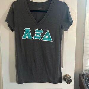 Alpha Xi Delta stitched letters
